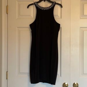 Sleeveless little black dress with jeweled collar